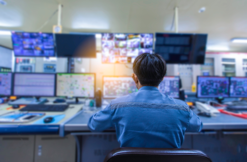 Engineer works with the tablet in the production control room