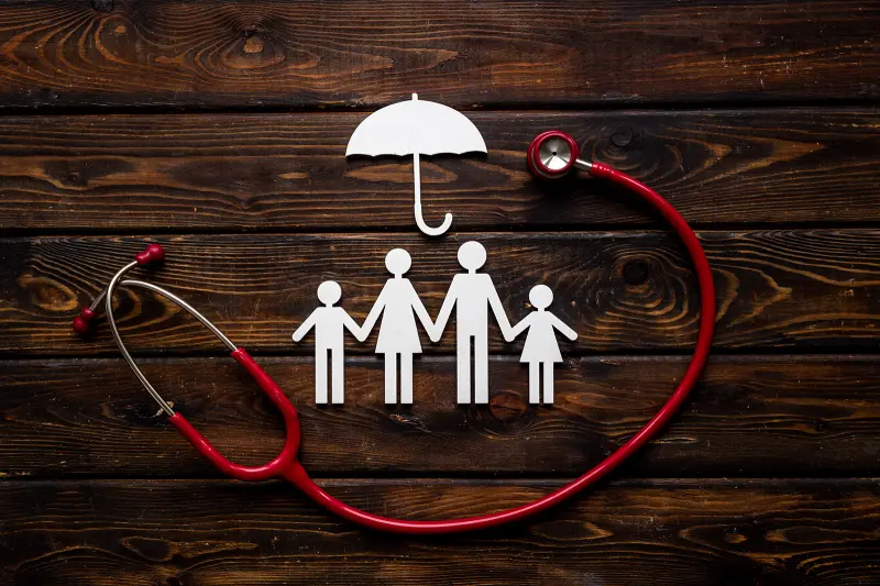 Family figure with stethoscope healthcare and doctor concept